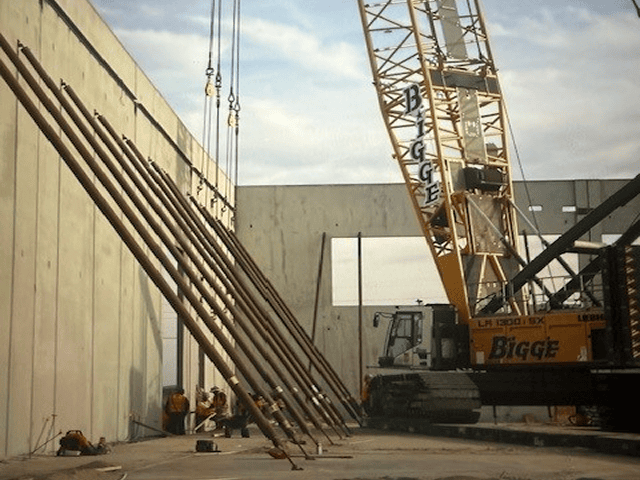 Construction site with crane and workers